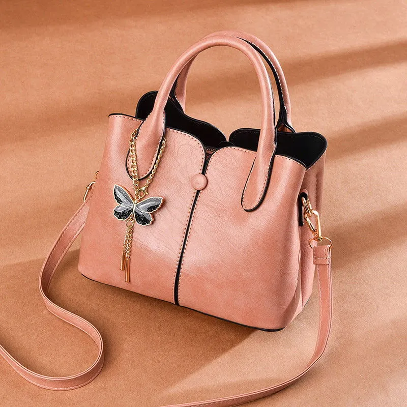 Butterfly Pendant Top Handle Satchel Leather Handbags